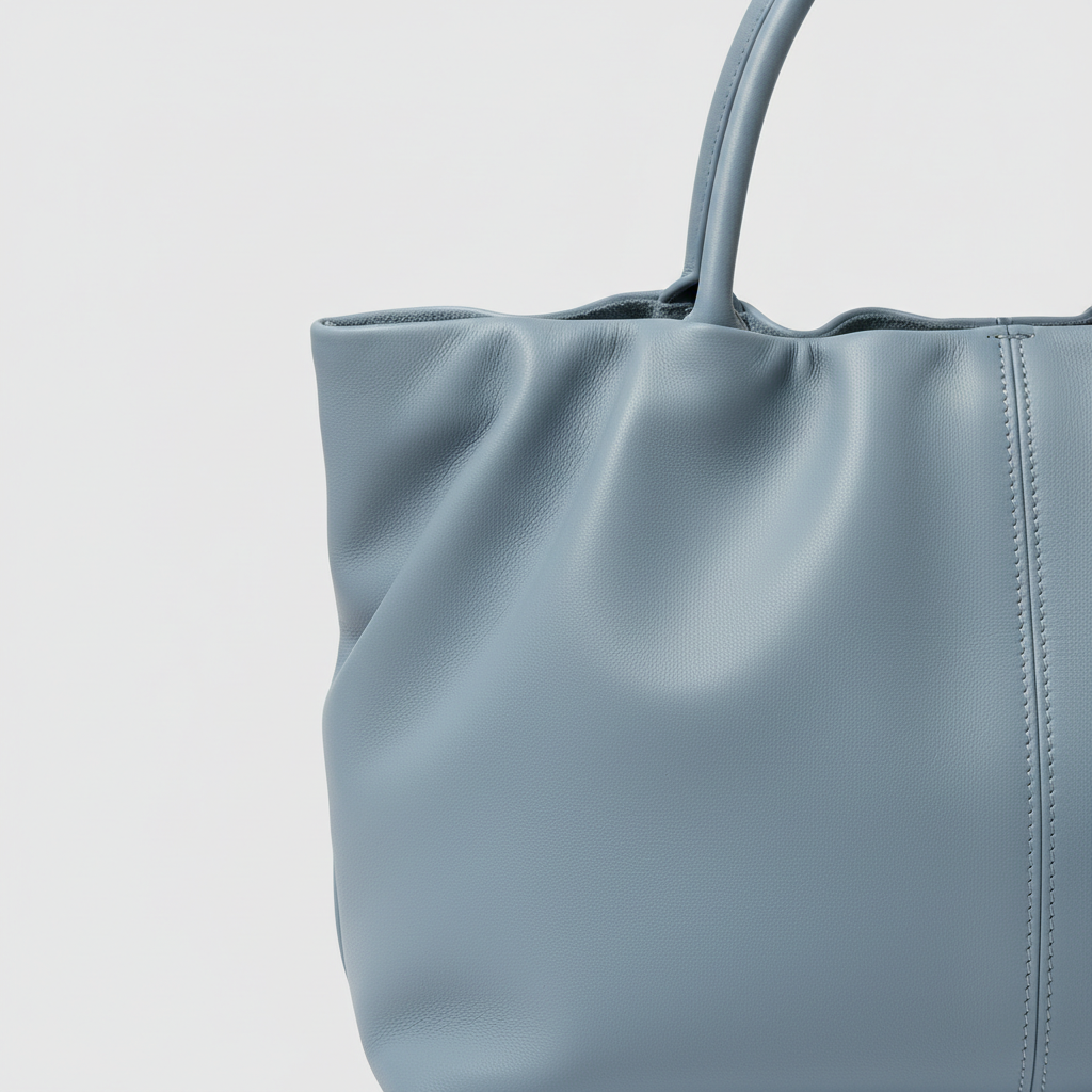 City Sleek Bag gathered tote in Sky Blue – leather detail close-up
